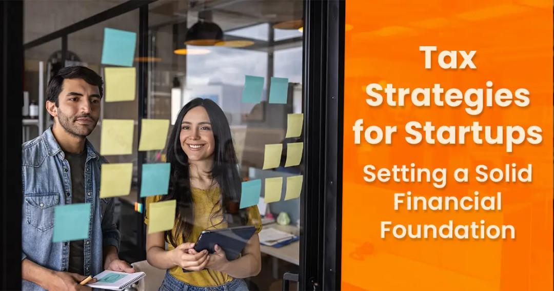 Two people standing in front of glass wall with sticky notes, holding tablets. Text on the right reads, "Tax Strategies for Startups: Setting a Solid Financial Foundation.