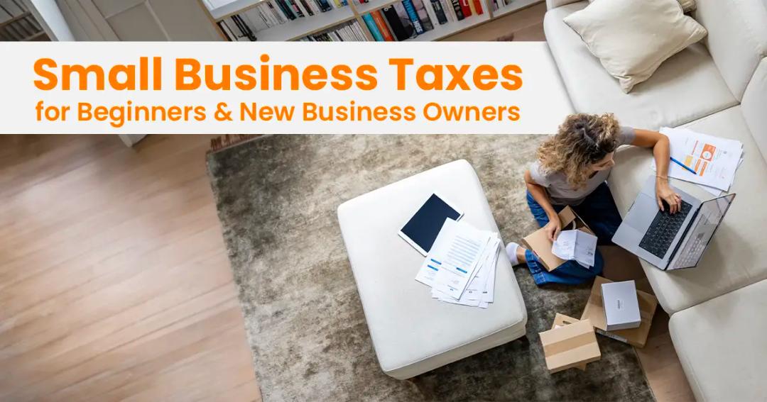 Person sitting on the floor next to a sofa, working on a laptop with documents, and a box nearby. Text overlay says "Small Business Taxes for Beginners & New Business Owners.